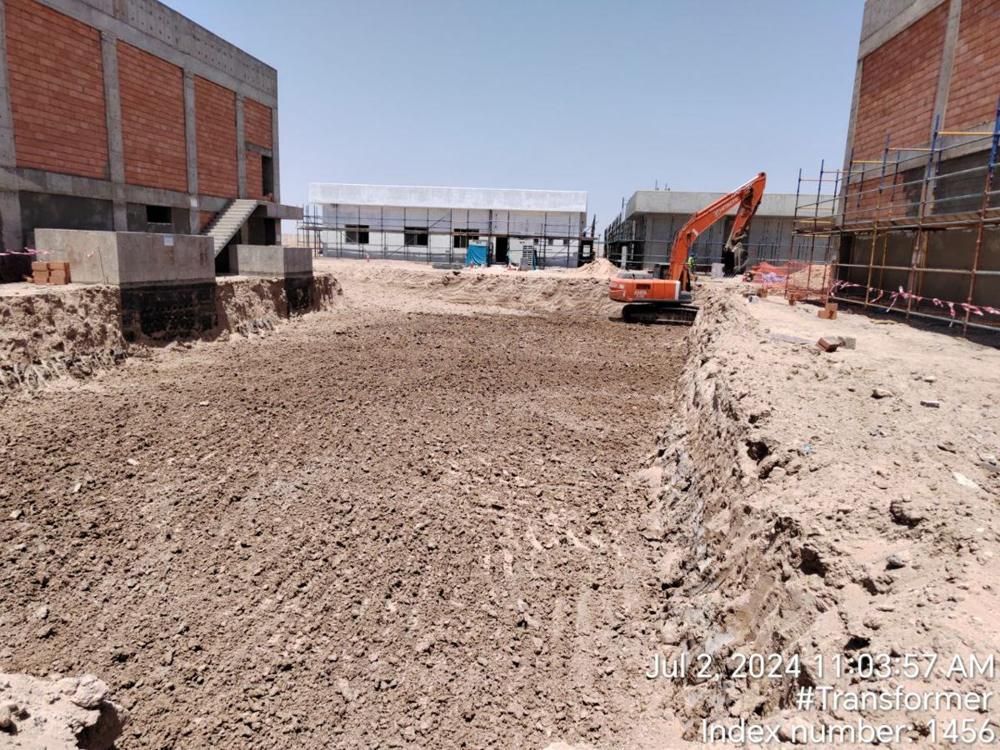 Excavation for the transformer foundations, with excavator and dump truck at the water treatment plant